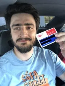 Holding my AAA membership card