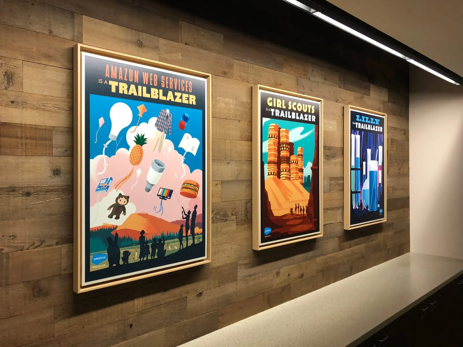 Salesforce branding posters on the wall