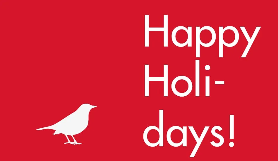 A red card reading "Happy Holidays!" in white, with a white silhouette of a small bird beside the text.